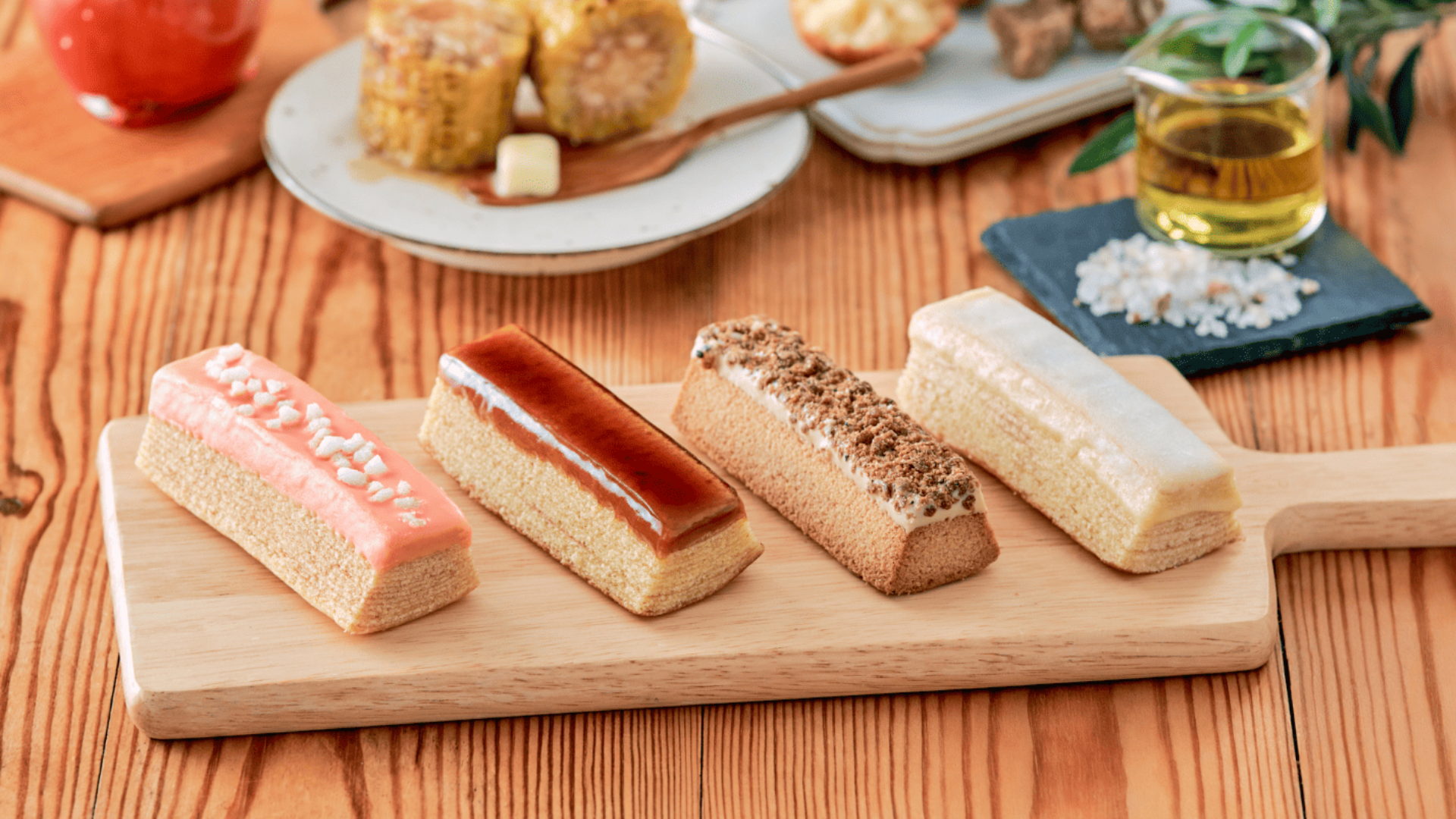 無印良品、「みんなでつくるバウム」第2弾を期間限定発売。りんご飴・焼きとうもろこし・サーターアンダギー・オリーブ塩の4種