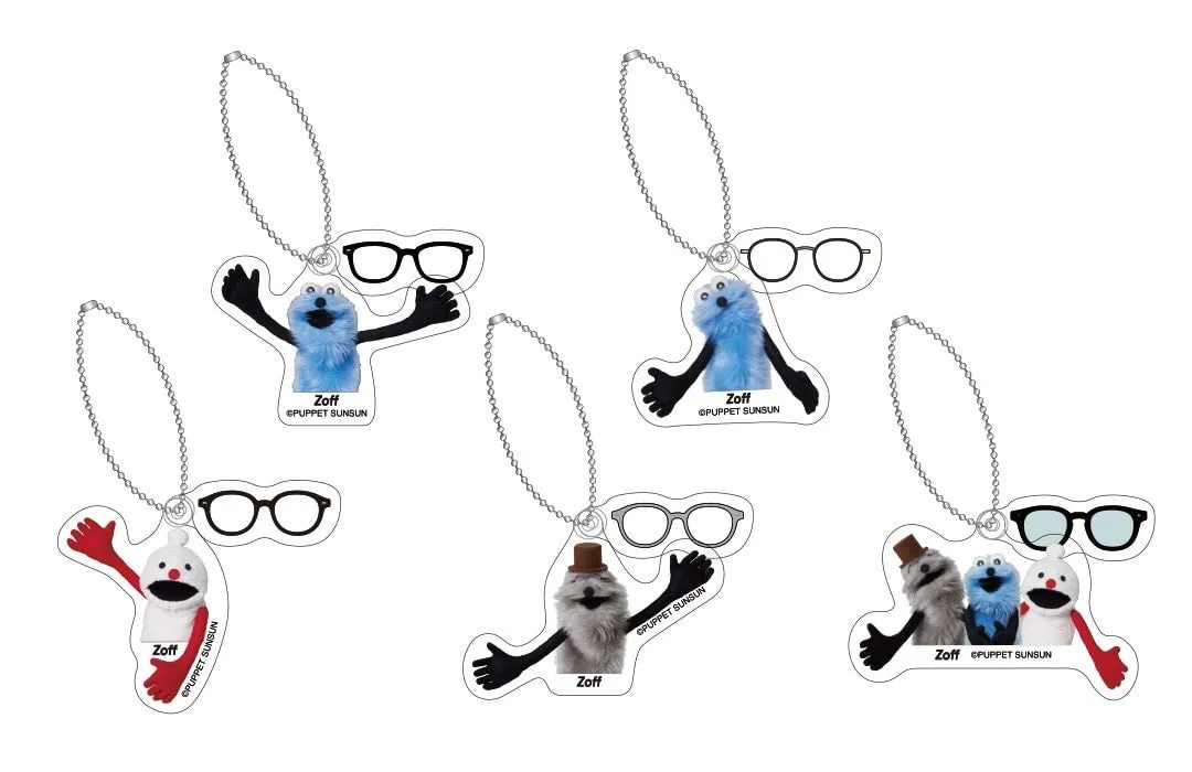 Zoffのキャラクターのキーホルダーが複数写っている画像です。キャラクターは、メガネをかけており、様々なポーズをしています。